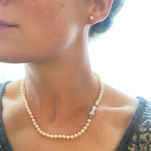 Mikimoto Sea Magic Strand cultured pearl necklace and earrings.